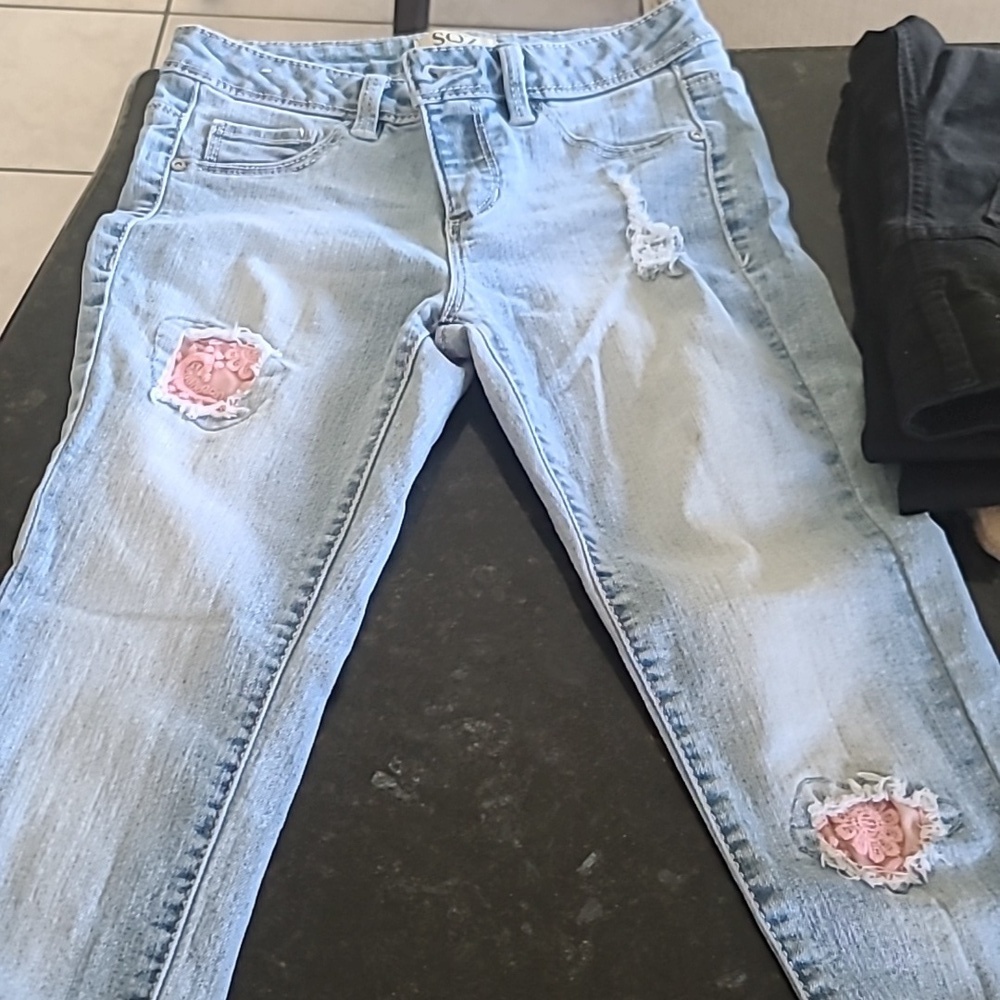 Cute blue skinny jeans with lace patches